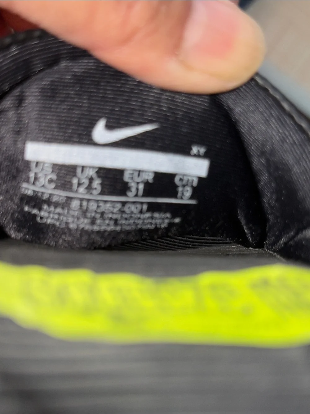Youth Nike Black Slides with White Swoosh